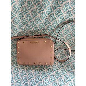 Michael KorsStyle: Studded Saffiano Leather CrossbodyColor: Blush Pink with Gold